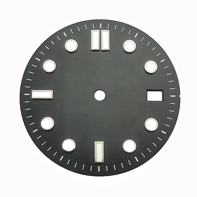 A black and white retro diving dial with baton hour markers.