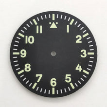 Black and green dial, Arabic numeral hour markers, customizable logo, available for models 8215 and NH35.