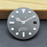 Black and white diving watch dial scene image