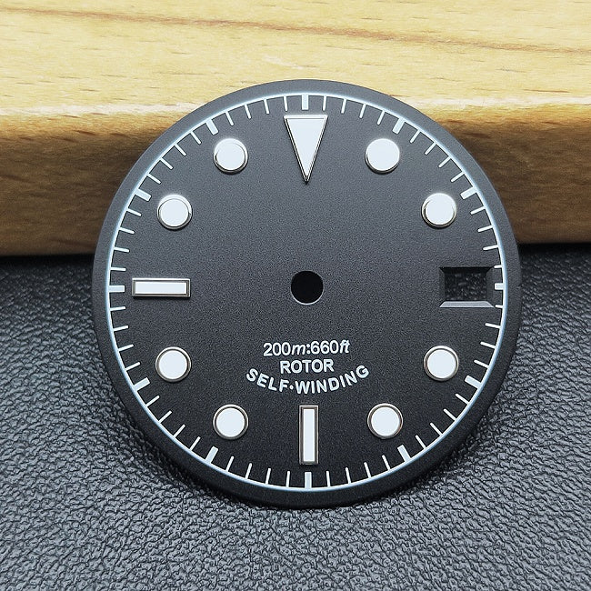 Black and white military watch dial,