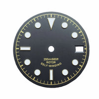 Black, white, and yellow military-style watch dial,