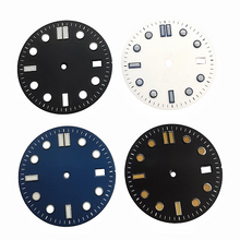 Four vintage-style diving dials with baton hour markers.