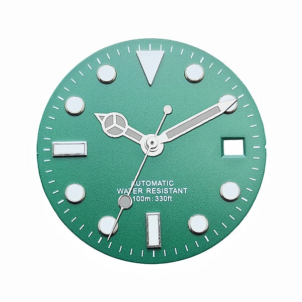 Green and white diving watch dial scene image