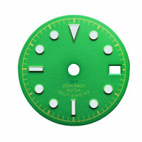 Green and white military watch dial,