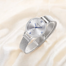 View of the right side of a custom women's quartz watch.